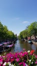 dutch city Amsterdam flowers on bridge overlooking canals in holland