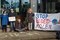Dutch climate activists during protest against coal mining in front of The Havengebouw building in Amsterdam