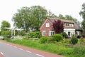 Dutch country house with a garden, canal and a draw-bridge, Netherlands