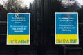 Dutch and English Signs Condemning Putin\'s War in Ukraine Hung on a Window in Amsterdam Royalty Free Stock Photo