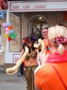 Dutch fan is photographed with a half-naked woman-snake for a small fee.