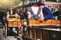 Dutch farmers dressed with traditional clothing at local cheese market Royalty Free Stock Photo