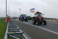 Dutch farmers protest with tractors driving over the interstate A12