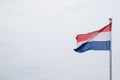 Dutch flag flying in the wind Royalty Free Stock Photo