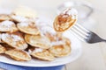 Dutch food: 'Poffertjes' or little pancakes Royalty Free Stock Photo