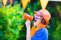 Dutch football fan, cute boy cheering Royalty Free Stock Photo