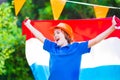 Dutch football fan, little adorable happy boy cheering Royalty Free Stock Photo