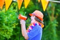 Dutch football fan, little happy boy cheering Royalty Free Stock Photo