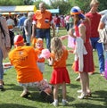 Dutch happy family at Koningsdag (Kingsday), Amsterdam, Netherlands Royalty Free Stock Photo