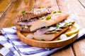 Dutch herring. Toast with Dutch herring, onions, pickles. Traditional rustic appetizer with seafood. Popular food in the