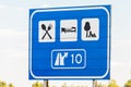 Dutch highway exit sign with tourist directions Royalty Free Stock Photo