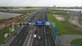 Dutch highway near Amsterdam Zeeburg A10 exit S114 and a small traffic jam aerial view.