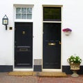 Dutch classic house green front doors lanterns plants flowers Netherlands Royalty Free Stock Photo