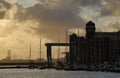 dutch industry behind nature in sunset in amsterdam Royalty Free Stock Photo