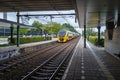 Dutch intercity train arrives at railway station