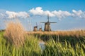 Dutch landscape with three windmills Royalty Free Stock Photo