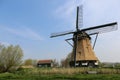 Dutch landscape with a windmill Royalty Free Stock Photo
