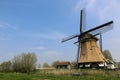 Dutch landscape with a windmill Royalty Free Stock Photo