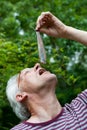 Dutch man is eating herring