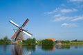 Dutch mill at the waterside Royalty Free Stock Photo
