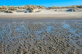 Dutch North Sea beach at low tide on a sunny winter day Royalty Free Stock Photo