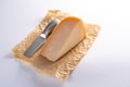 Dutch old Amsterdam cheese, made from goat milk on white backg