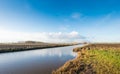 Dutch polder landscape in low afternoon sunlight Royalty Free Stock Photo