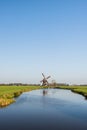 Dutch polder landscape with windmill