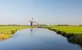 Dutch polder landscape with windmill