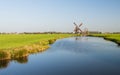 Dutch polder landscape with windmill