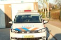 Dutch police car parked on the street in nieuwerkerk aan den Ijssel in the netherlands with text politie which means police in eng