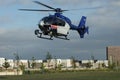 Dutch police helicopter landing in a urban park Royalty Free Stock Photo