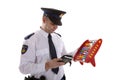 Dutch police officer is counting vouchers quotas with abacus over white background Royalty Free Stock Photo