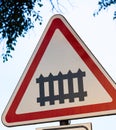 Dutch road sign: level crossing with barrier or gates ahead