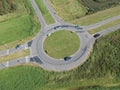 Dutch roundabout with passing cars Royalty Free Stock Photo