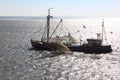 Dutch shrimper sails over dutch Waddensea, Ameland Royalty Free Stock Photo