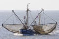 Dutch shrimper sails over the Wadden Sea near Ameland Royalty Free Stock Photo