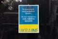 Dutch Sign Condemning Putin\'s War in Ukraine Hung on a Window in Amsterdam Royalty Free Stock Photo
