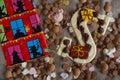 Dutch Sinterklaas tradition:A chocolate letter, a present and candy called Pepernoten Royalty Free Stock Photo