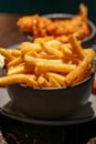 Dutch snacks for beer or wine, french fried potato chips and deep fried tempura shrimps and hot dip sauce Royalty Free Stock Photo