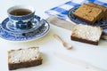 Dutch spiced bread called Ontbijtkoek or Peperkoek. On white table Royalty Free Stock Photo