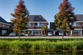 Dutch Suburban area with modern family houses, newly build modern family homes in the Netherlands, dutch family house Royalty Free Stock Photo