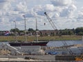 A Dutch Tall Ship passing the Construction site of the new North Sea Canal Lock