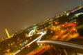 Dutch tilt Highway 395 with car lights trails. Washington DC Night photography aerial view. Washington Monument