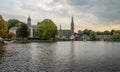 Dutch town Ouderkerk aan de Amstel, view of the church on the bank of river Amstel