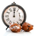 Dutch traditional oliebollen and clock