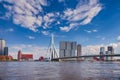 Dutch Travel Concepts. Attractive View of Renowned Erasmusbrug Swan Bridge in Rotterdam in front of Port and Harbour. Picture