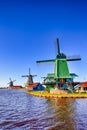 Dutch Travel Concepts. Traditional Dutch Windmills in the Village of Zaanse Schans at Daytime in the Netherlands Royalty Free Stock Photo