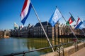 Dutch, United nations and afghan flags at parliament The Hague Royalty Free Stock Photo
