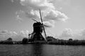 Dutch windmill on canal Royalty Free Stock Photo